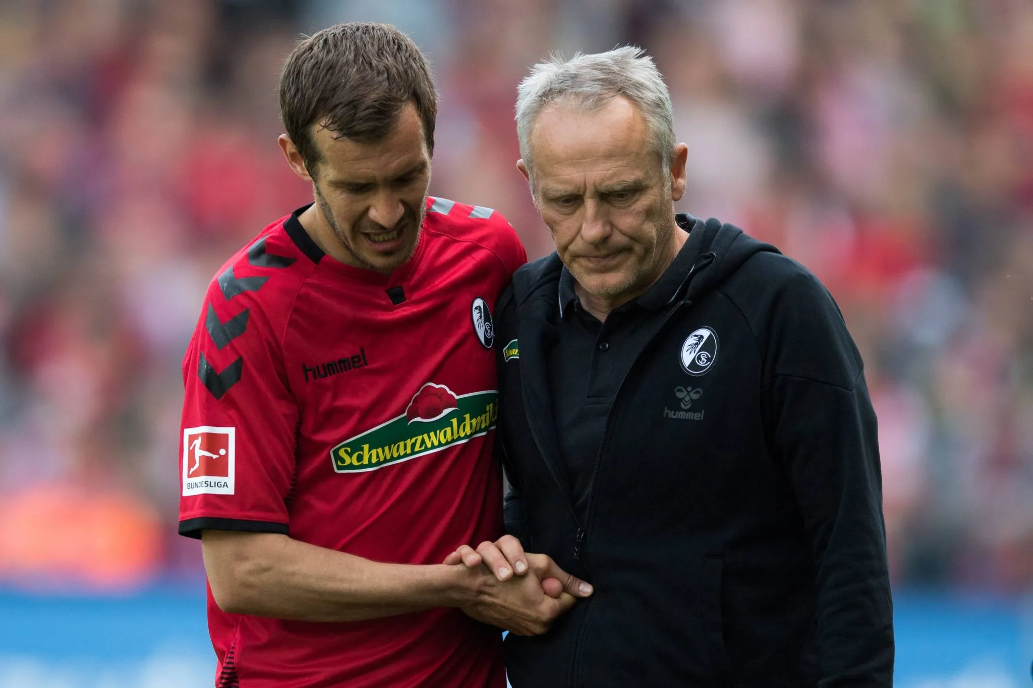 Julian Schuster nos tempos de jogador, quando era treinado por Christian Streich no Freiburg