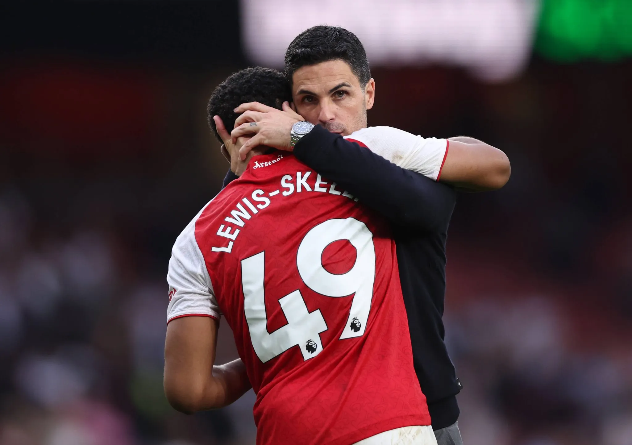 Lewis-Skelly e Arteta em jogo do Arsenal
