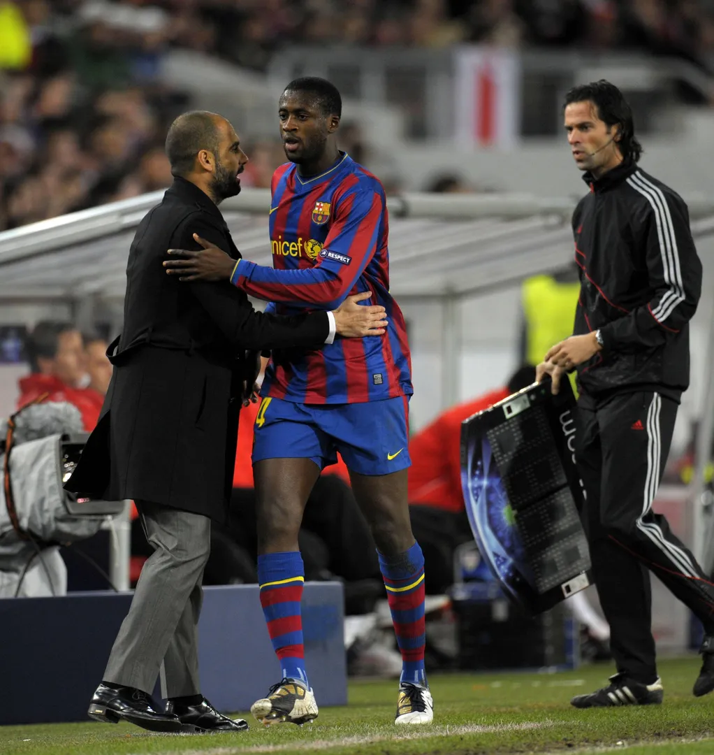 Yaya Tour&eacute; e Guardiola no Barcelona