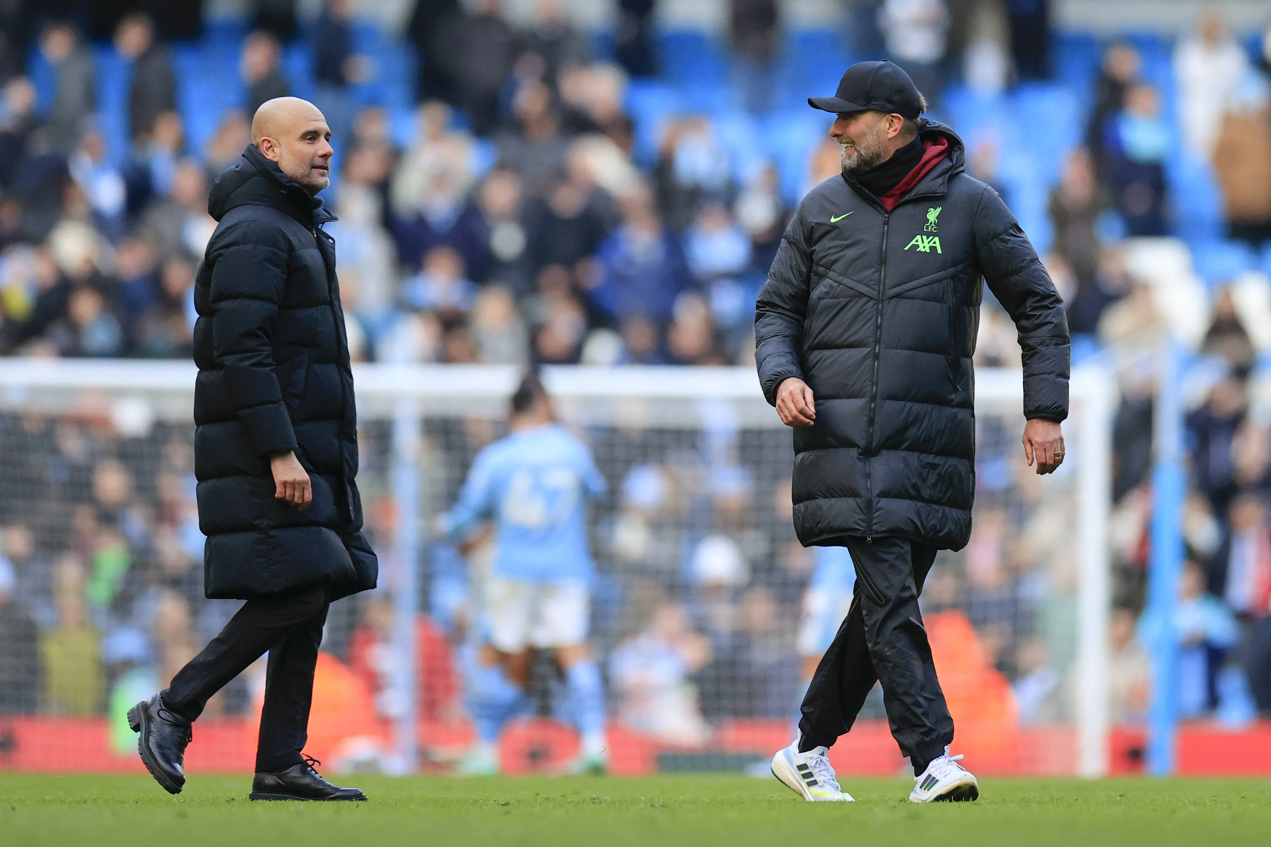 Pep Guardiola e J&uuml;rgen Klopp ap&oacute;s jogo entre Manchester City e Liverpool