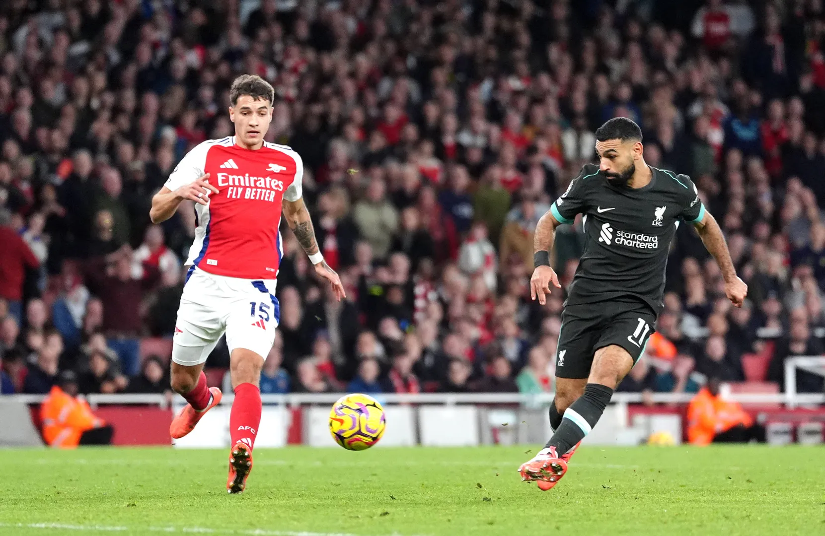 Foto: (Imago) - Mohamed Salah durante seu gol marcado pelo Liverpool contra o Arsenal