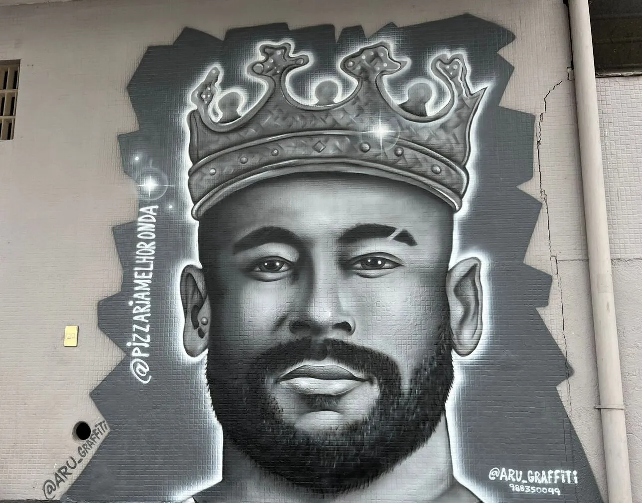 Neymar no muro perto da Vila