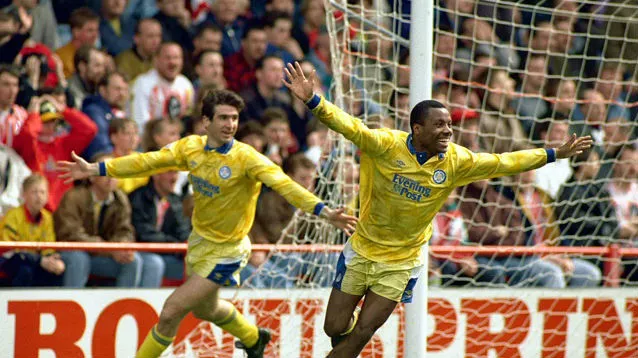 Wallace and Cantona celebrate against Sheffield United