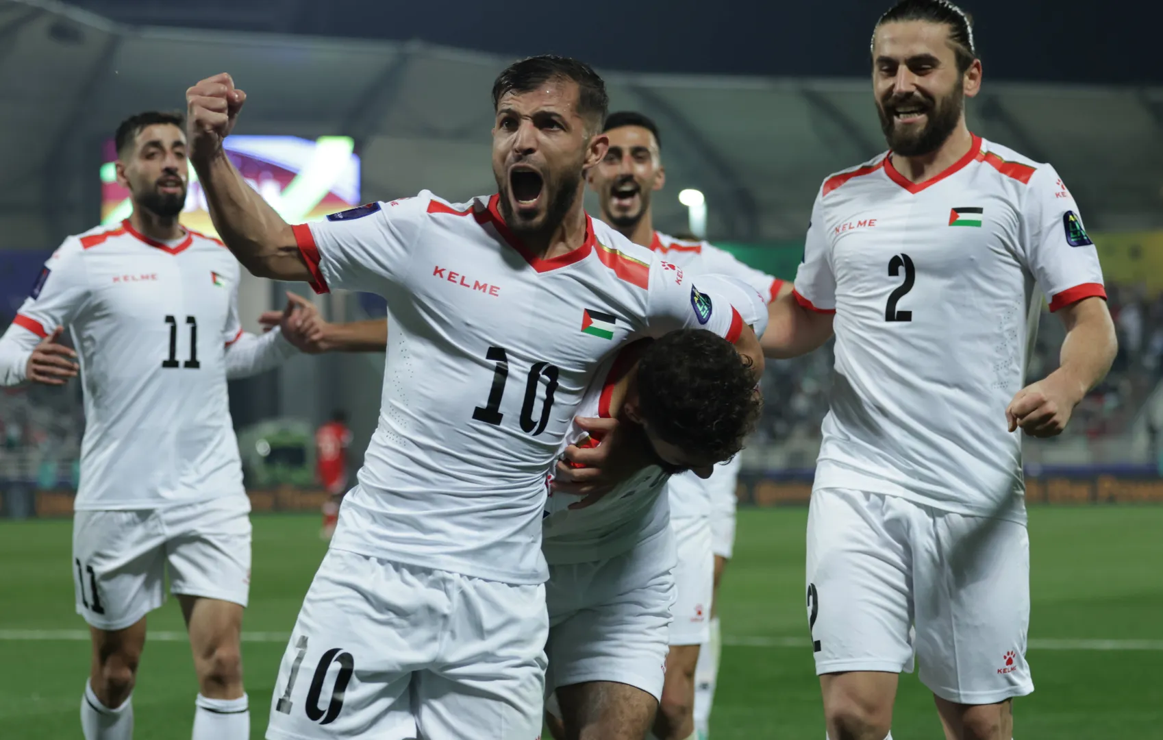 Jogadores da sele&ccedil;&atilde;o palestina comemoram gol