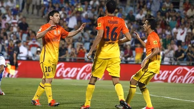 Aqui n&atilde;o! Com dois de Messi, Barcelona goleia o Getafe