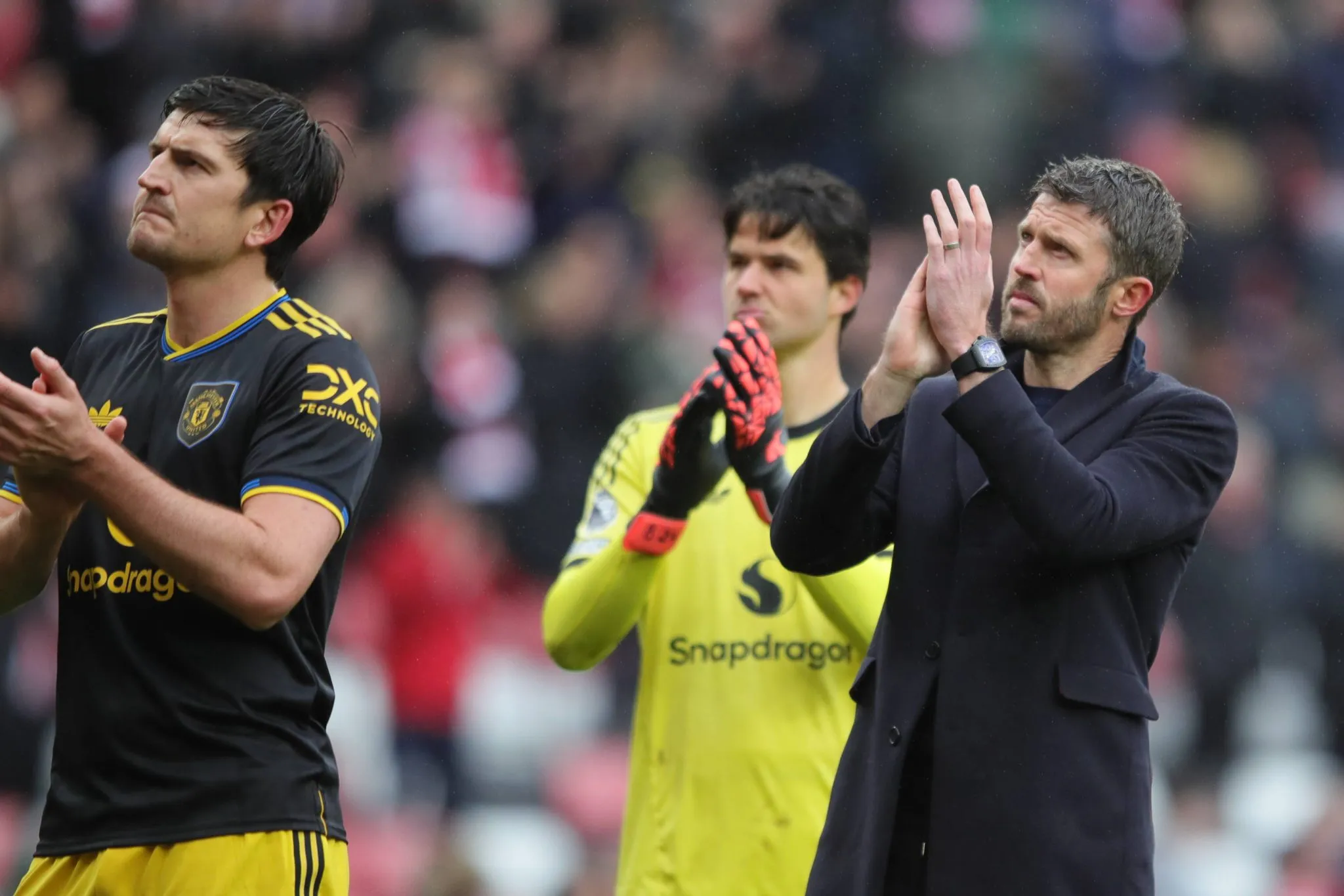 Carrick aplaude torcedores do United ap&oacute;s empate contra o Sunderland