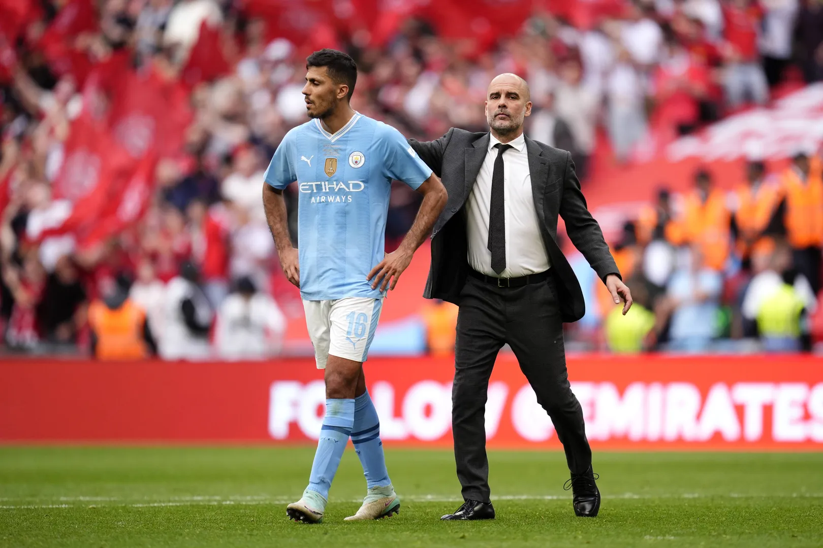 Rodri e Guardiola. Foto: Imago