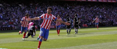 Atl&eacute;tico detona Granada e p&otilde;e press&atilde;o no Real Madrid