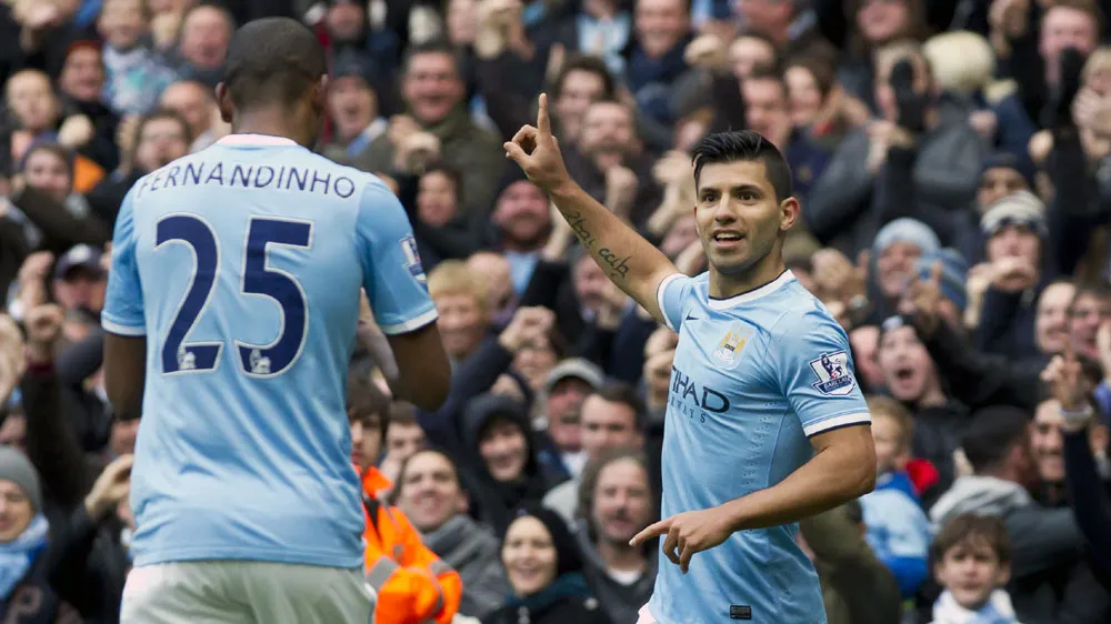 Fernandinho e Ag&uuml;ero: os dois marcaram contra o Arsenal (AP Photo/Jon Super)