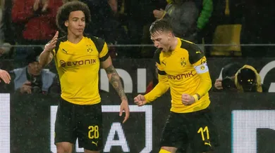 Mesmo sem a lideran&ccedil;a, o Dortmund arrancou uma vit&oacute;ria suada para seguir emparelhado ao Bayern